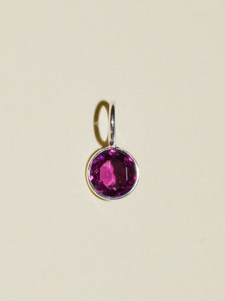 Dolly Rhodolite Round Cut Charm in Sterling Silver