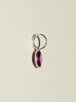 Dolly Rhodolite Round Cut Charm in Sterling Silver