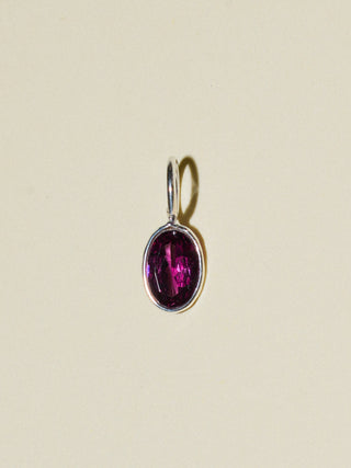 Lovey Rhodolite Oval Cut Charm in Sterling Silver