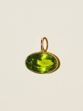 help I need kelp Peridot East West Oval Cut Charm in Yellow 14k Gold