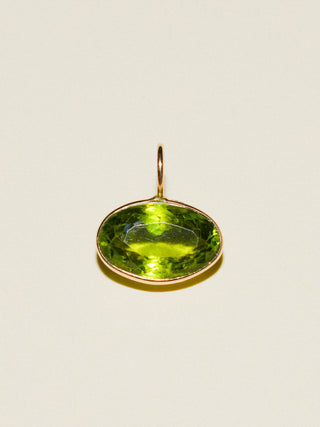 help I need kelp Peridot East West Oval Cut Charm in Yellow 14k Gold