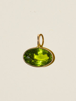 help I need kelp Peridot East West Oval Cut Charm in Yellow 14k Gold