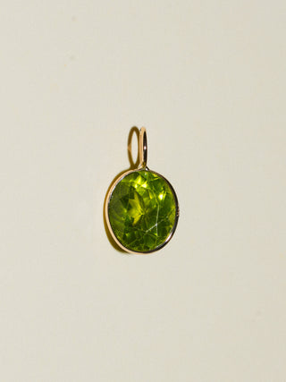 Tia Peridot Oval Cut Charm in Yellow 14k Gold
