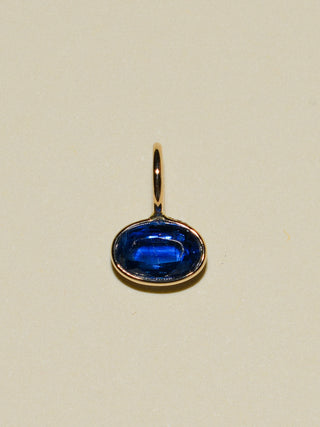 Waxing Kyanite East West Oval Cut Charm in Yellow 14k Gold