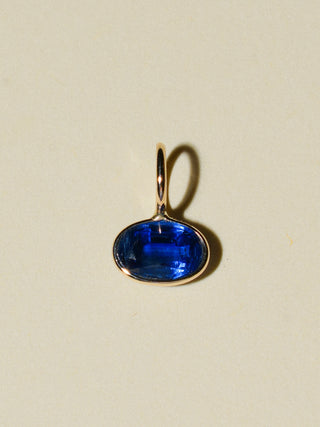 Waxing Kyanite East West Oval Cut Charm in Yellow 14k Gold