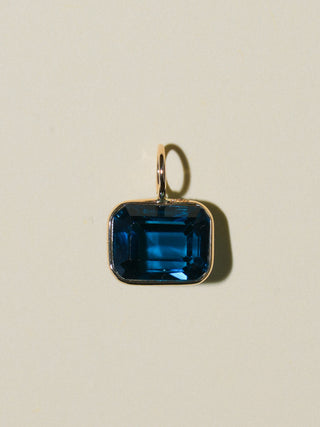 Crushing Waves London Blue Topaz East West Emerald Cut Charm in Yellow 14k Gold