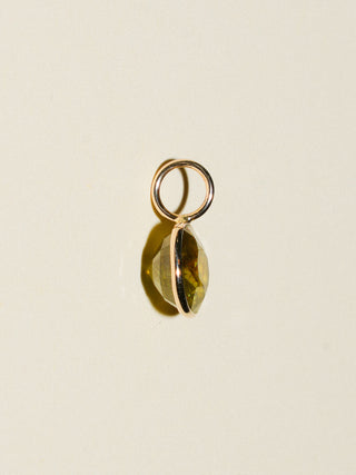 Sing your song siren Sphene East West Oval Cut Charm in Yellow 14k Gold
