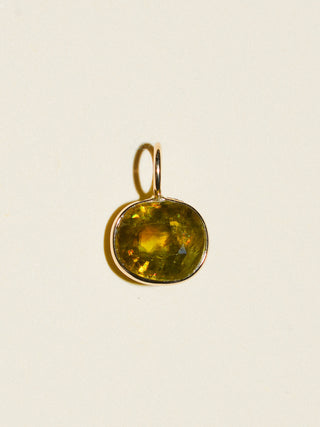 Sing your song siren Sphene East West Oval Cut Charm in Yellow 14k Gold