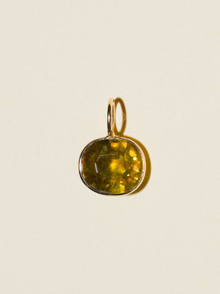 Sing your song siren Sphene East West Oval Cut Charm in Yellow 14k Gold