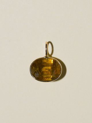 Bronzing Brass Sphene East West Oval Cut Charm in Yellow 14k Gold