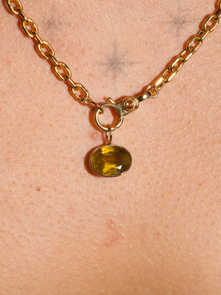 Bronzing Brass Sphene East West Oval Cut Charm in Yellow 14k Gold