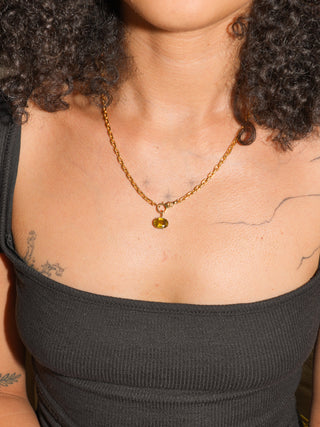 Bronzing Brass Sphene East West Oval Cut Charm in Yellow 14k Gold