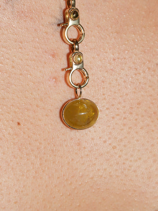 Beach Grass Baby Grossular Garnet East to West Oval Cabochon Charm in Yellow 14k Gold
