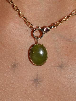 Leeping Lilypad Grossular Garnet Oval Cabochon Charm in Yellow 14k Gold