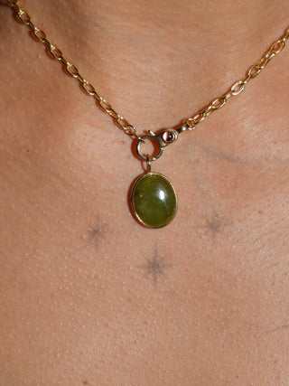 Leeping Lilypad Grossular Garnet Oval Cabochon Charm in Yellow 14k Gold