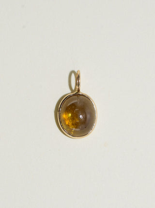 Rocky Mountain Grossular Garnet Oval Cabochon Charm in Yellow 14k Gold