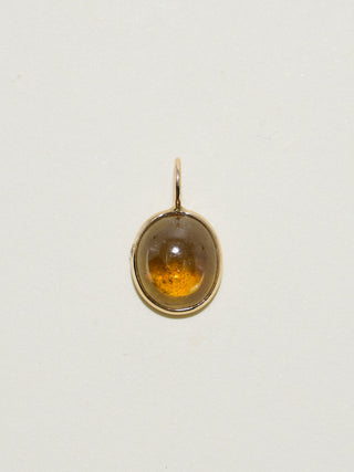 Rocky Mountain Grossular Garnet Oval Cabochon Charm in Yellow 14k Gold
