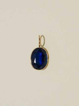 Tickled Kyanite Oval Cut Charm in Yellow 14k Gold