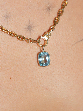 Call Out Sky Blue Topaz Cushion Cut Charm in Yellow 14k Gold