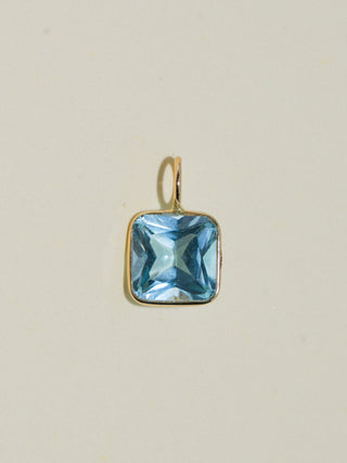 Clear as Sky Blue Topaz Cushion Cut Charm in Yellow 14k Gold