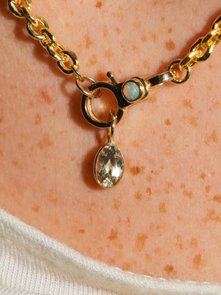 looming Zultanite Oval Cut Charm in Yellow 14k Gold
