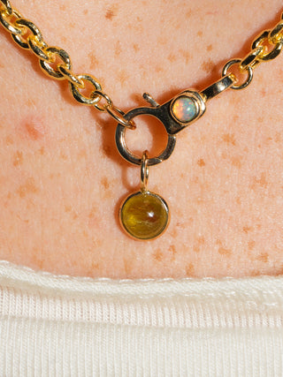 Swampy Grossular Garnet Round Cabochon Charm in Yellow 14k Gold
