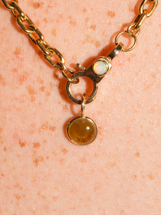 Margaret Grossular Garnet Oval Cabochon Charm in Yellow 14k Gold