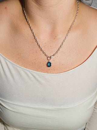 Pleased Swiss Blue Topaz Oval Cut Charm in Sterling Silver