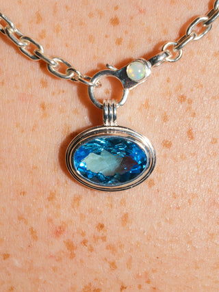 Sleeping Cheeky Swiss Blue Topaz Triple East to West Oval Cut Charm in Sterling Silver