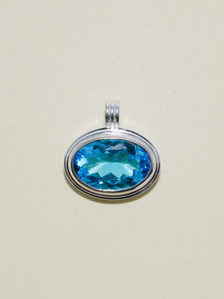 Sleeping Cheeky Swiss Blue Topaz Triple East to West Oval Cut Charm in Sterling Silver