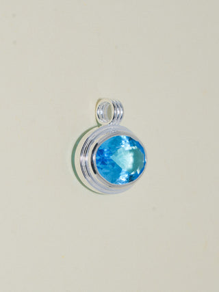 Sleeping Cheeky Swiss Blue Topaz Triple East to West Oval Cut Charm in Sterling Silver