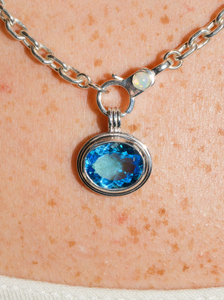 Rassy Swiss Blue Topaz Triple East to West Oval Cut Charm in Sterling Silver