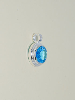 Rassy Swiss Blue Topaz Triple East to West Oval Cut Charm in Sterling Silver