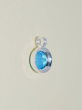 Rassy Swiss Blue Topaz Triple East to West Oval Cut Charm in Sterling Silver