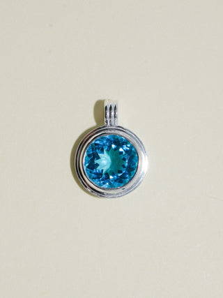 Whirlpool Swiss Blue Topaz Triple Round Cut Charm in Sterling Silver