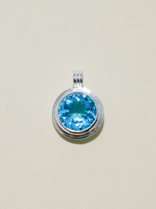 Whirlpool Swiss Blue Topaz Triple Round Cut Charm in Sterling Silver