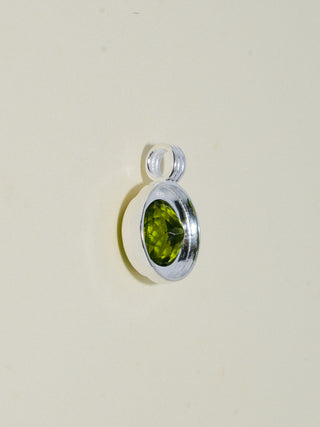 Humid Hair Peridot Triple Round Cut Charm in Sterling Silver