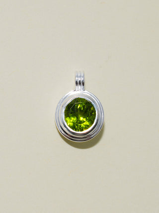 Humid Hair Peridot Triple Round Cut Charm in Sterling Silver