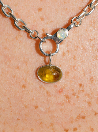 Croc Hunter Grossular Garnet East to West Oval Cabochon Charm in Sterling Silver