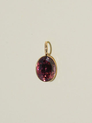TD Pink Zircon Oval Cut Charm in Yellow 14k Gold