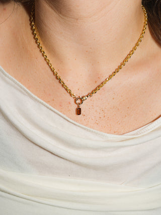 Oh it's burnt Brown Tourmaline Emerald Cut Charm in Yellow 14k Gold