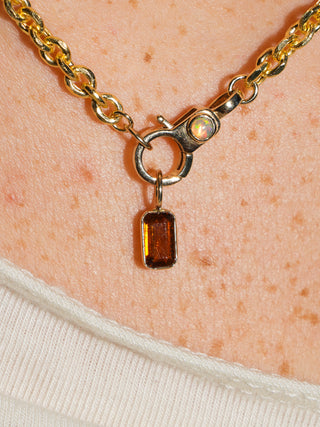 Oh it's burnt Brown Tourmaline Emerald Cut Charm in Yellow 14k Gold