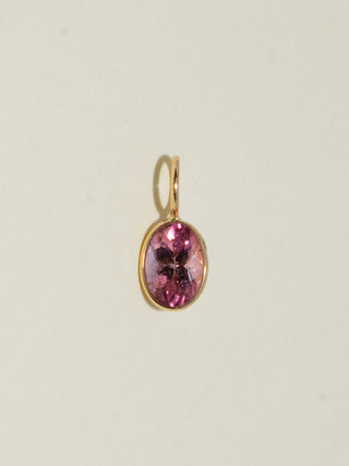 Neighborhood Pink Tourmaline Oval Cut Charm in Yellow 14k Gold