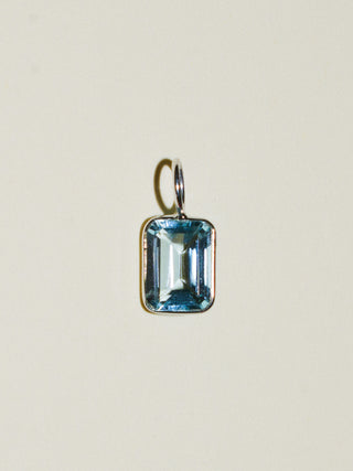 Early Morning Sky Blue Topaz Emerald Cut Charm in White 14k Gold