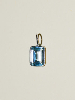 Early Morning Sky Blue Topaz Emerald Cut Charm in White 14k Gold