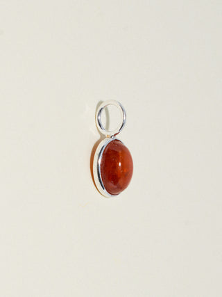 Burnt Orange Garnet Oval Cabochon Charm in Sterling Silver