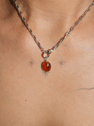 Cardamom Orange Garnet Oval Cabochon Charm in Sterling Silver