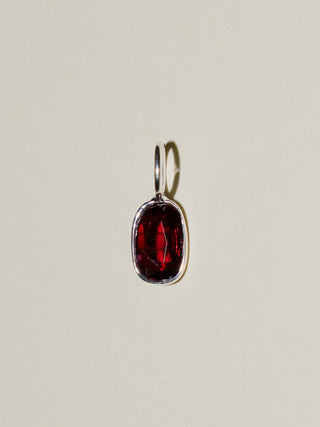 Bleeding Maroon Spinel Oval Cut Charm in Sterling Silver