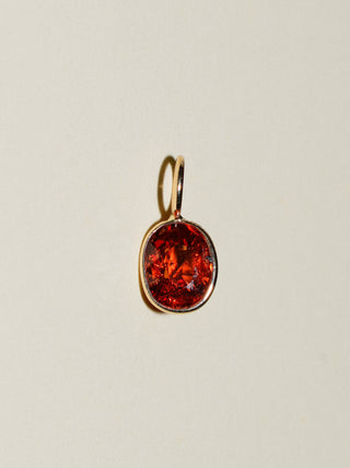 Freckled Spessartite Oval Cut Charm in Yellow 14k Gold