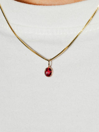 Spicy Red Sapphire Oval Cut Charm in Yellow 14k Gold